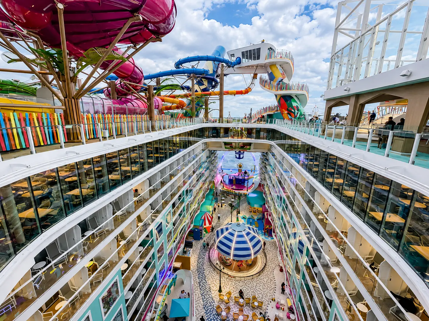 Large modern cruise ship with multiple decks